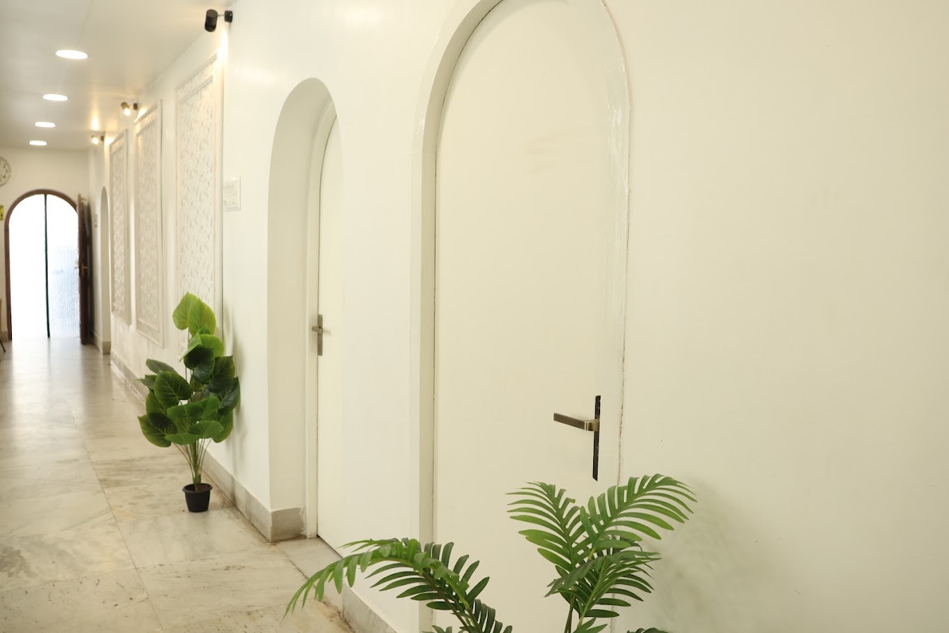 Calm arched corridor leading to the scan rooms